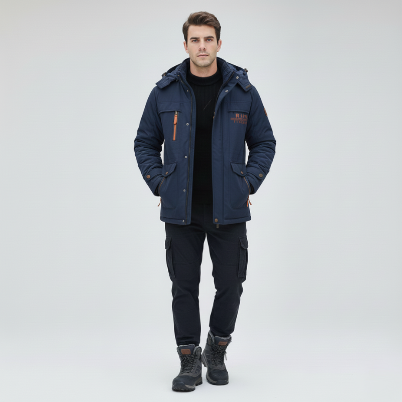 Man wearing a navy blue jacket and pants on a white background