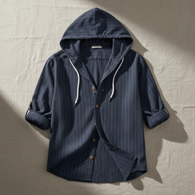 Blue pinstripe hooded shirt on a beige textured background