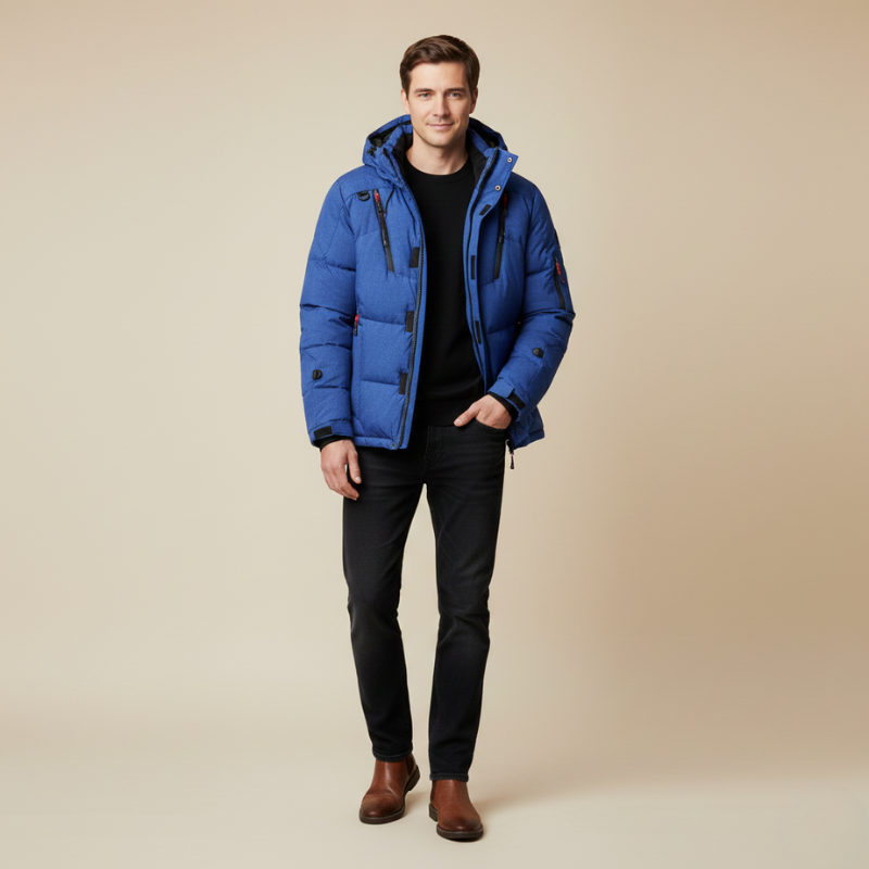 Man wearing a blue puffer jacket on a beige background