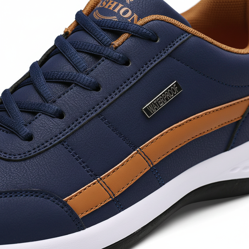 Man standing in a blue denim jacket styled with jeans and casual sneakers.