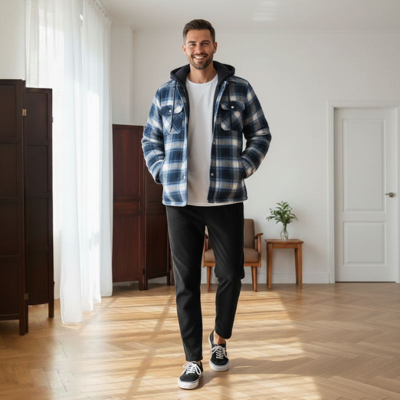 Full-body image of a man wearing a hooded plaid jacket styled for everyday casual wear.