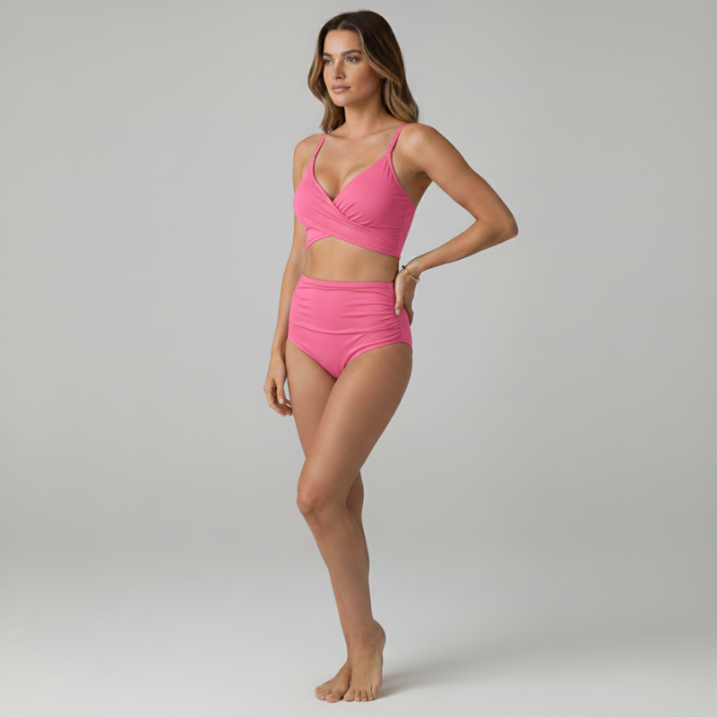 Woman wearing a pink bikini set on a gray background