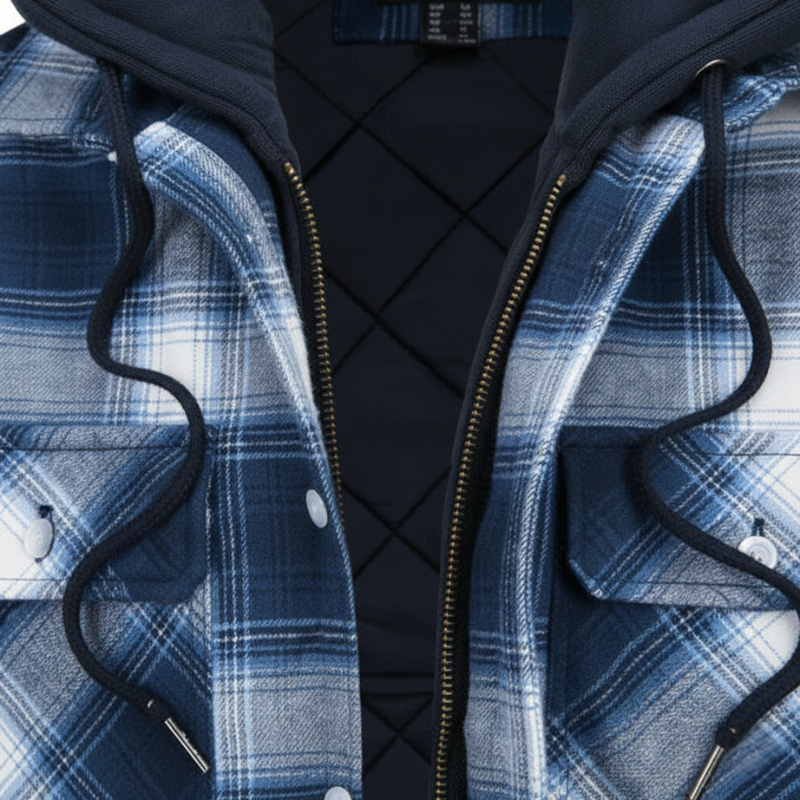Close-up of a blue plaid jacket showing zipper closure, hood lining, and textured fabric.