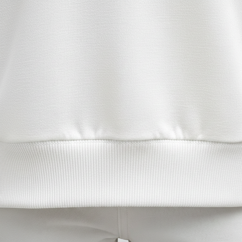 Close-up of a white fabric texture with a subtle pattern